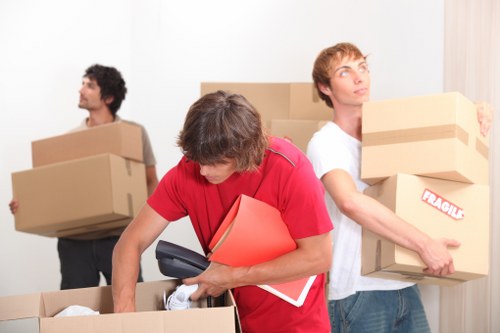 Preparing office furniture and labelled boxes for relocation in Barnes