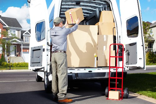 Crew loading household items into a moving truck