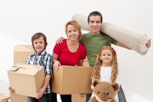 Collection of bulky household furniture in Barnes