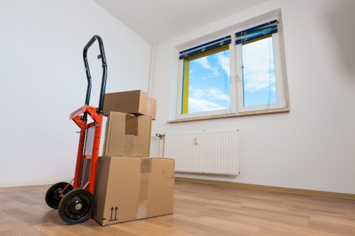 Boxes and furniture being loaded for a Barnes relocation