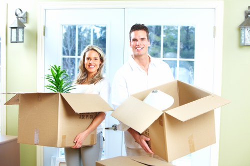 Business relocation team handling office items for a move in Barnes